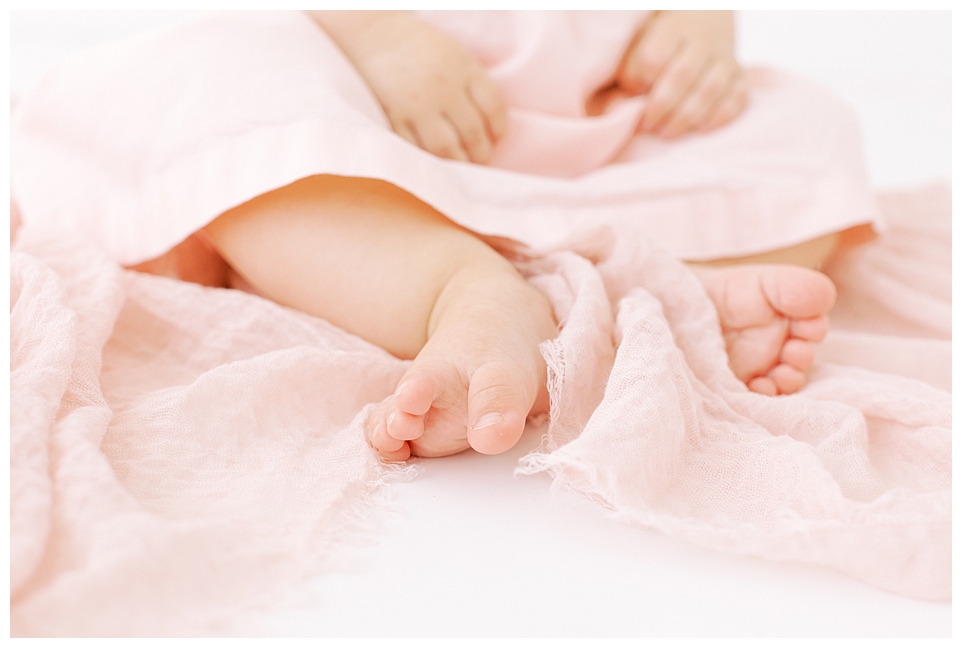 Baby girl toes close up, 6 month milestone session with Halleigh Hill Photographer