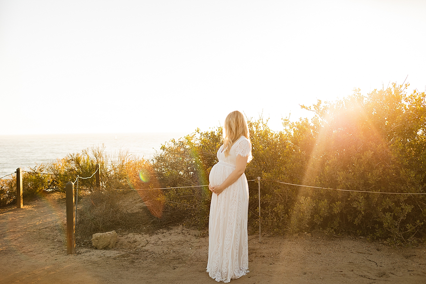 during their Orange County Maternity Session | Image by Halleigh Hill 