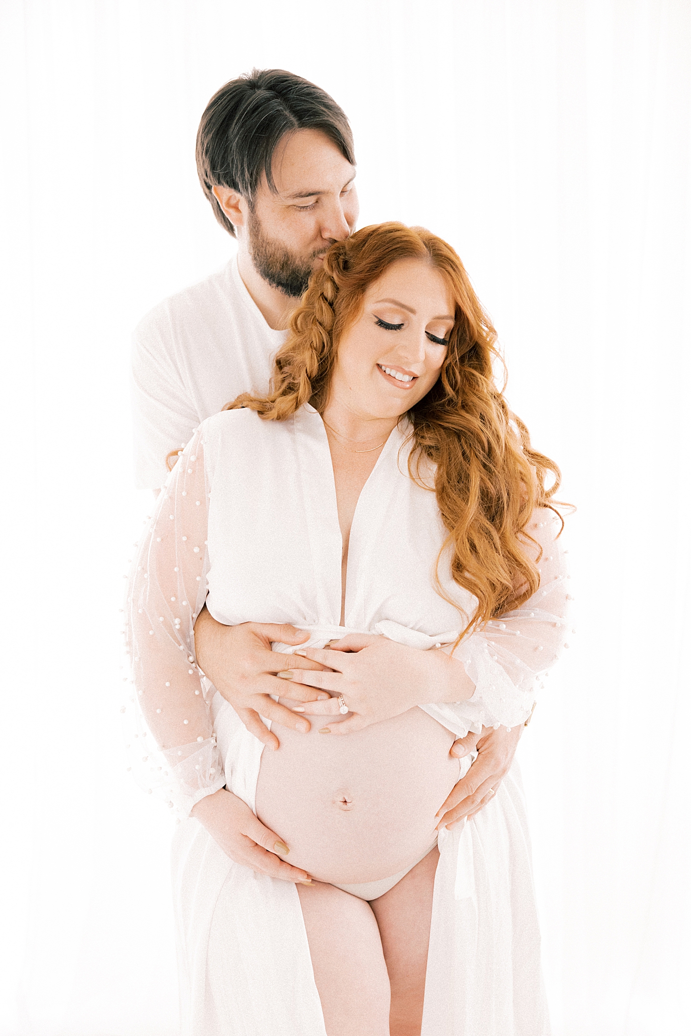 during their Newport Beach Maternity Session | Image by Halleigh Hill 